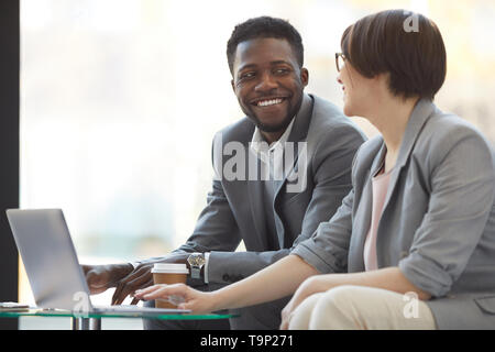Positive creative business team at work Stock Photo