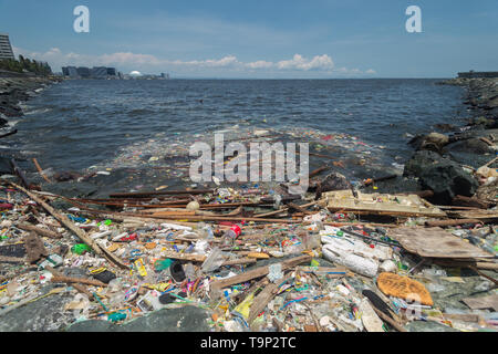 Manila, Philippines - May, 18, 2019: Ocean plastic pollution in Manila Bay shore Stock Photo