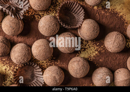 Tasty chocolate truffles on metal tray Stock Photo