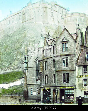 Edinburgh Castle from Grassmarket, hand coloured photo Stock Photo