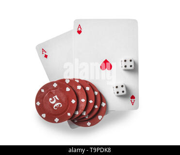 Chips with cards and dices for poker game on white background Stock Photo