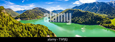 Aerial view of beautiful turquoise lake Sylvenstein. Shore beach with swimming Plattform Stock Photo