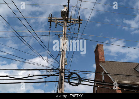 many electric cables on old maryland houses Stock Photo