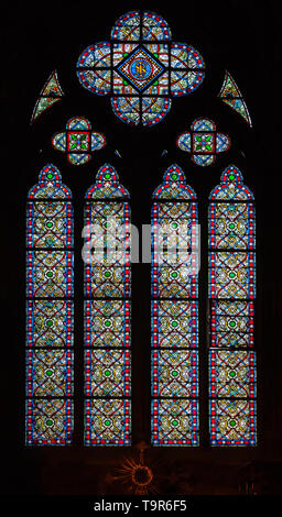 PARIS, FRANCE - APRIL 25: Stained glass window in Cathedral Notre Dame de Paris on april 25, 2011 in Paris. Stock Photo