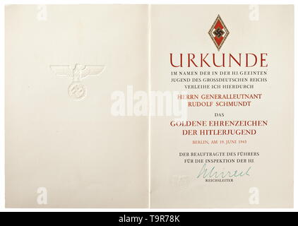 General of Infantry Rudolf Schmundt - an award document for the Golden Hitler Youth Badge of Honour Double-sided certificate in DIN A4 format, bound with thread stitching in the certificate folder, embossed with a national eagle. The text leaf printed in gold, terra-colour and black, at the head the HJ badge with a border of golden oak leaves. At the bottom, to the left of the signature of 'Reichsleiter' Baldur von Schirach in green ink, the embossed seal of the 'Beauftragter des Führers für die Inspektion der HJ' (tr. 'Authorised Representative of the Führer for the Inspec, Editorial-Use-Only Stock Photo
