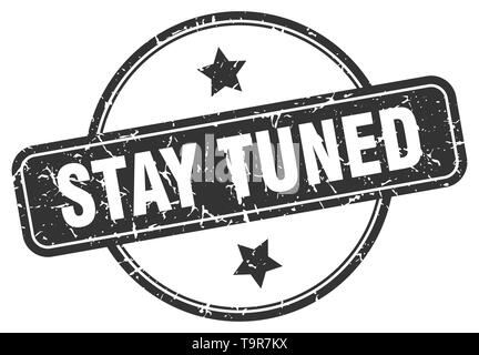 stay tuned round vintage grunge stamp Stock Vector