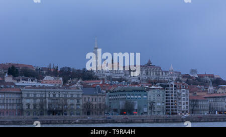 Budapest Hungary 03 15 2019 The Matthias Church in Budapest from the Chain Bridge at night Stock Photo