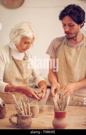 Nice pleasant people being engaged in the process Stock Photo