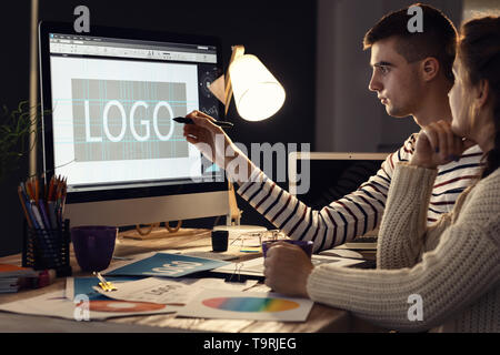 Young designers working in studio Stock Photo