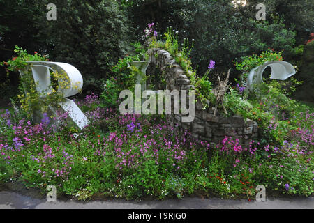 Wild Walls, an installation wrapping around the letters RHS (Royal Horticultural Society) on display at the 2019 RHS Chelsea Flower Show which opened today in the 11-acre grounds of the Royal Hospital Chelsea, London, United Kingdom - 20 May 2019  There are 26 themed gardens on display at this year’s show as well as over 100 plant displays in the Great Pavilion. New plants are often launched at the show and the popularity of older varieties revived, it is, in effect, the garden design equivalent of a catwalk at a fashion show. Stock Photo