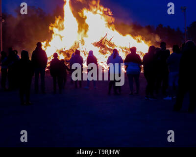 MAY FIRE at the end of april with people celebraiting spring Stock ...