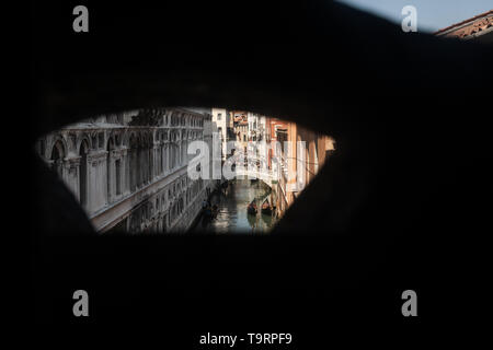 Venice, Italy - April 18 2019 view of Venice from Bridge of Sighs during the day.  This was the last view of Venice of prisoniers before going to jail Stock Photo