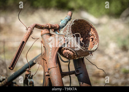 Old rusted abandoned motorcycle in desolate barn Stock Photo - Alamy