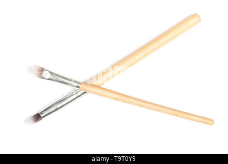 Set of thin makeup brushes isolated on white Stock Photo