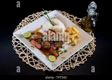 Peruvian food: Lomo Saltado, Salted beef in a dish Stock Photo