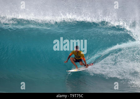 Brazilian pro-surfer, Gabriel Medina, rides the 'backdoor' and scores a 10 at the 2014 Pipe Masters, Banzai Pipeline, Ehukai Beach Park, North Shore,  Stock Photo