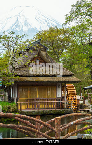 Genuine watermill in small traditional village Oshino Hakkai. Fuji Five Lake region. Japan. Stock Photo