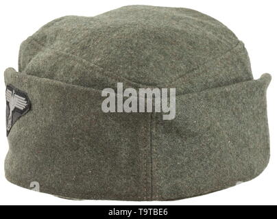 A field cap M 43 for enlisted men/NCOs of the Waffen-SS late model with National eagle on left side Depot piece in field-grey woollen cloth, grained zinc buttons, BeVo-woven insignia (machine-stitched), brown inner liner with handwritten size designation '58'. In minimally used condition. historic, historical, 20th century, 1930s, 1940s, Waffen-SS, armed division of the SS, armed service, armed services, NS, National Socialism, Nazism, Third Reich, German Reich, Germany, military, militaria, utensil, piece of equipment, utensils, object, objects, stills, clipping, clippings, Editorial-Use-Only Stock Photo