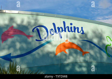 Orlando, Florida. March 09 2019.  Colorful Dolphins sign on wall at Seaworld in International Drive area. Stock Photo