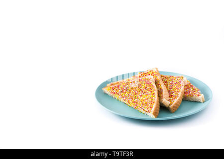 Traditional Australian fairy bread on plate isolated on white background. Copyspace Stock Photo