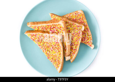 Traditional Australian fairy bread on plate isolated on white background. Top view Stock Photo