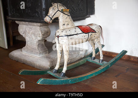 Antique wooden indoor rocking horse