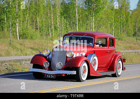 Salo, Finland. May 18, 2019. Beautiful red Lincoln KA classic car, presumably 1934, on Salon Maisema Cruising 2019. Stock Photo