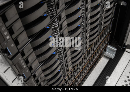 SAN Server Disk Cabinet In Rack At Datacenter Stock Photo