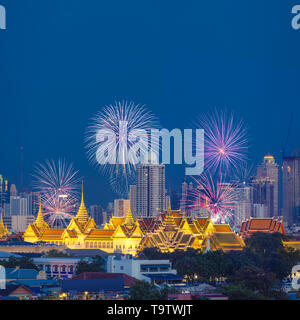Beautiful fireworks with grand palace and bangkok city in background Stock Photo