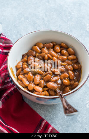 Homemade Barbecue Baked Beans in Porcelain Bowl. Organic Food. Stock Photo