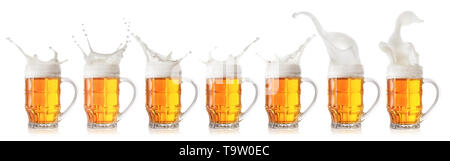 Splash of foamy light beer in mug isolated on white background. Collection, set Stock Photo