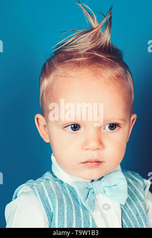 Healthy hair care habits. Small child with messy top haircut. Small boy  with stylish haircut. Boy child with stylish blond hair. Hair styling  products Stock Photo - Alamy