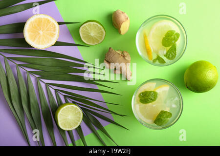 Composition with tasty lemonade on color background Stock Photo