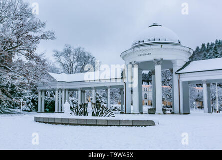 Marianske Lazne, Czech Republic - December 28 2017: Winter image of Rudolph Spring Pavilion at colonnade in Marienbad covered with snow. Stock Photo