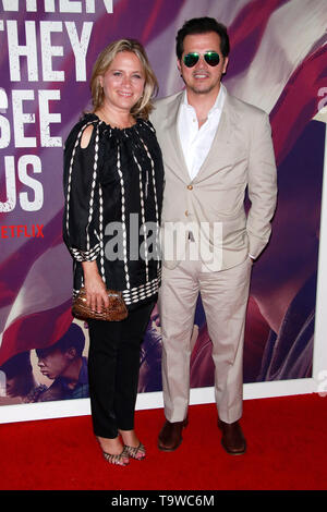 New York, NY, USA. 20th May, 2019. Justine Maurer and John Leguizamo at the Netflix world premiere of When They See Us at The Apollo Theatre in New York City on May 20, 2019. Credit: Diego Corredor/Media Punch/Alamy Live News Stock Photo