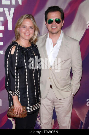 New York, NY, USA. 20th May, 2019. Justine Maurer and John Leguizamo at the Netflix world premiere of When They See Us at The Apollo Theatre in New York City on May 20, 2019. Credit: Diego Corredor/Media Punch/Alamy Live News Stock Photo