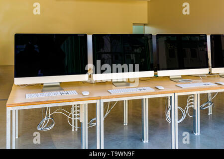 Empty modern school or university room with computers Stock Photo