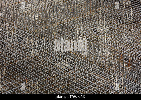 Fragment of the frame from the reinforcement, for pouring the formwork of the future building. Stock Photo