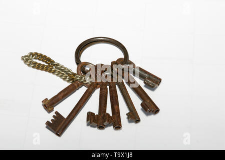 Bunch of rusty old keys with ring and chain Stock Photo