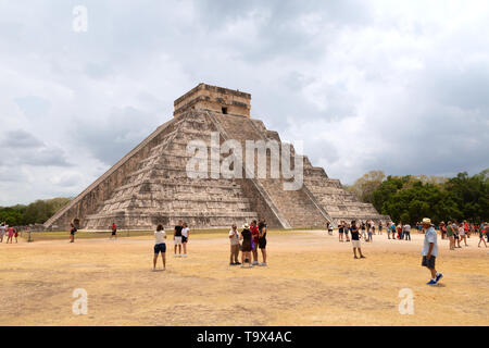 Mexico tourists at the Temple of Kukulcan at Chichen Itza mayan ruins; UNESCO world heritage site, Yucatan, Mexico Central America Stock Photo