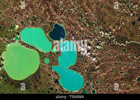 Ponds in the Yamal Peninsula in Northwest Siberia seen from space - contains modified Copernicus Sentinel Data (2018) Stock Photo