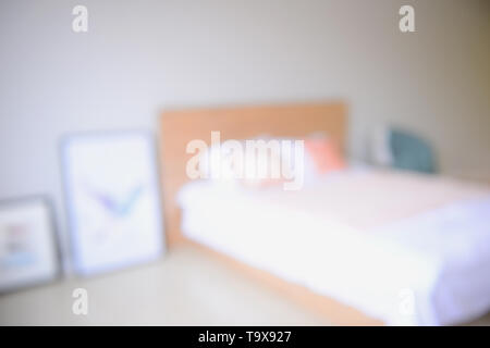 Blurred interior of modern bedroom Stock Photo