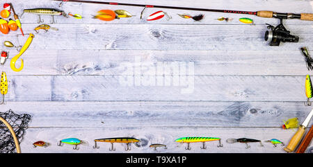 Fishing tackle overhead on wooden background with copy space Stock Photo