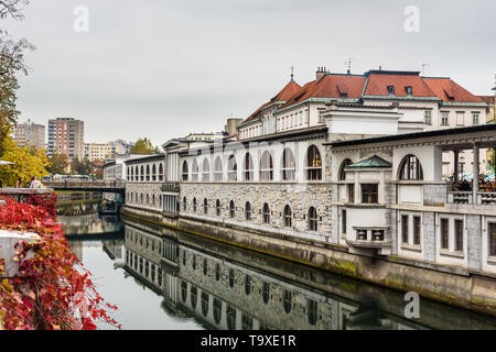 Ljubljana, Slovenia - October 26, 2018: Market arcade along Ljubljanica riverbank in Ljubljana Stock Photo