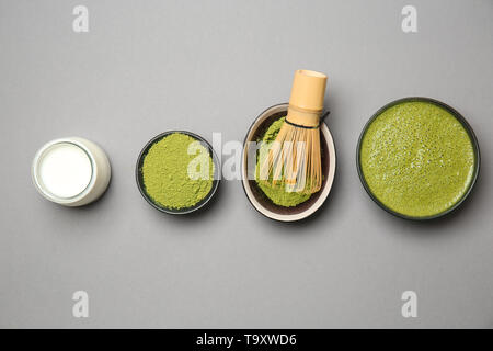 Composition with matcha tea on grey background Stock Photo