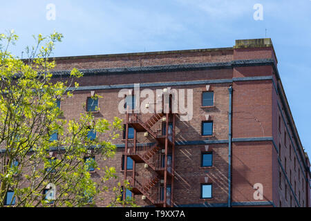 BRISTOL, UK - MAY 14 : Old red brick mill or warehouse  in Bristol on May 14, 2019 Stock Photo