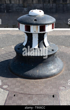 BRISTOL, UK - MAY 14 : Old mooring post outside the Harbour Masters Watch House by the River Avon at Clifton in Bristol on May 14, 2019 Stock Photo