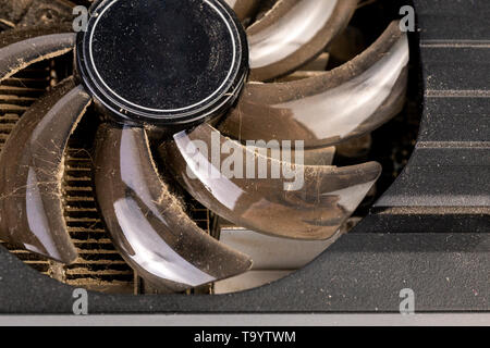 dusty video card cooling fan closeup with selective focus. Stock Photo