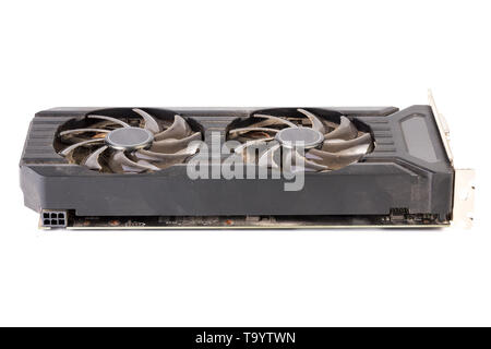 Used and dusty black PC video card isolated on white background. Stock Photo