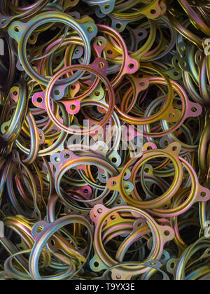 cadmuim with chromatization yellow protective coating stamped steel parts. Stock Photo